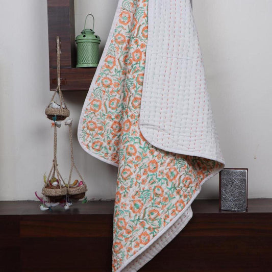 Baby quilt in Clementine - Yuniku London